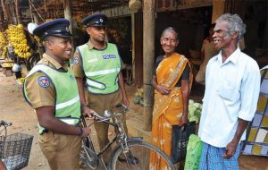 Lanka-cops-bike-hi-vis-tamils.jpg